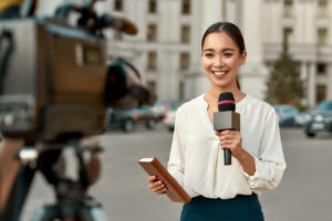 Portrait,Of,Professional,Female,Reporter,At,Work.,Young,Asian,Woman